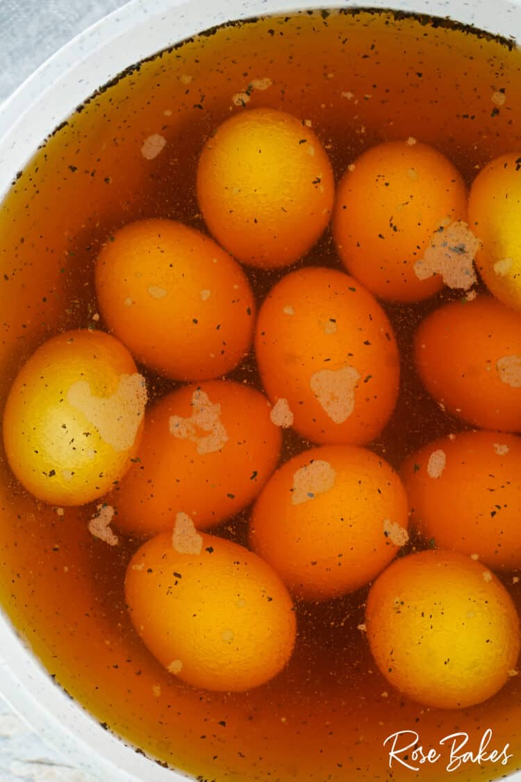 eggs sitting in mixture for coloring 
