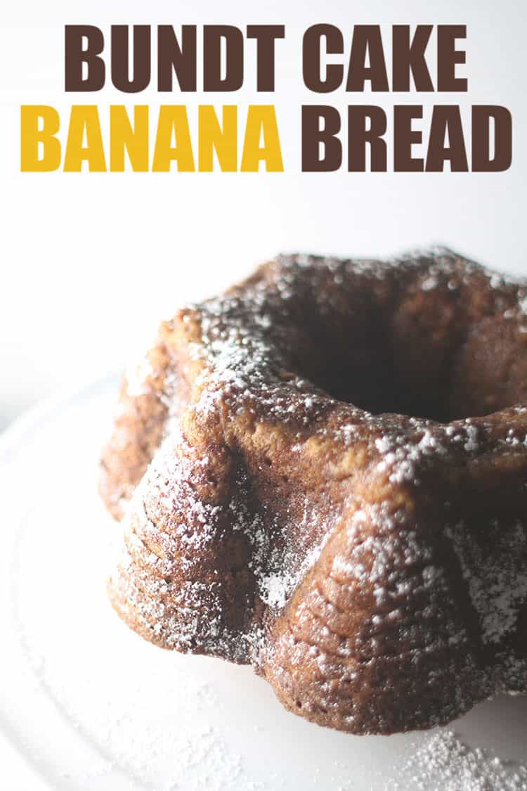 Bundt Cake Banana Bread on a cake plate dusted with powdered sugar