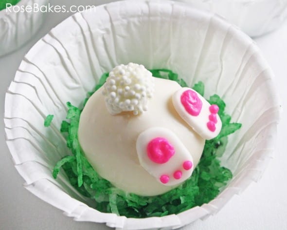 Bunny Tails Bottom Cake Balls in green coconut grass in white cupcake liners