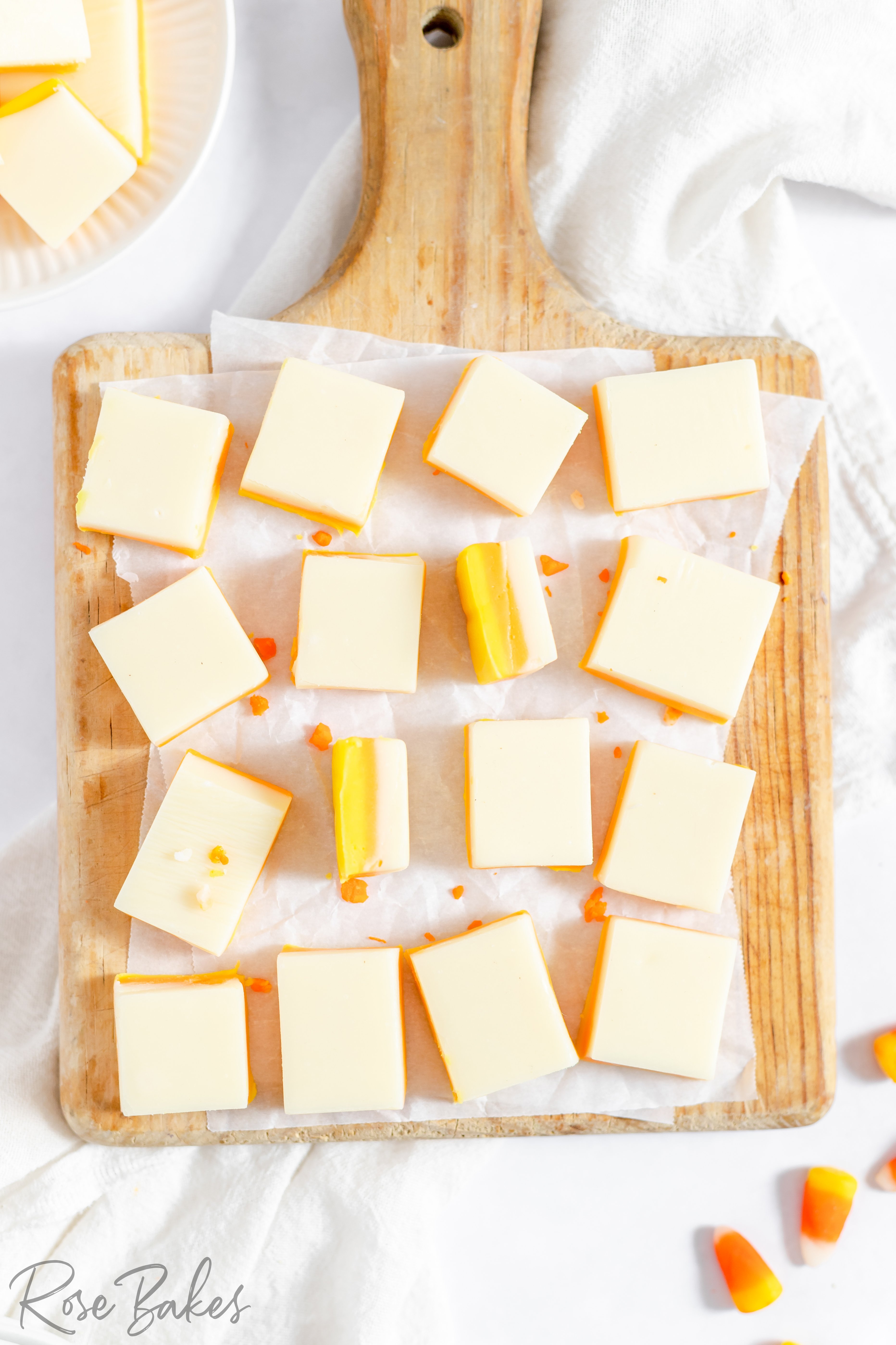 Easy Candy Corn Fudge on wooden serving tray