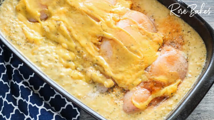 cheese soup spread over chicken breasts