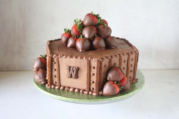 1 tier chocolate grooms cake with chocolate strawberries as topper 
10+ Simple groom's cake ideas 
