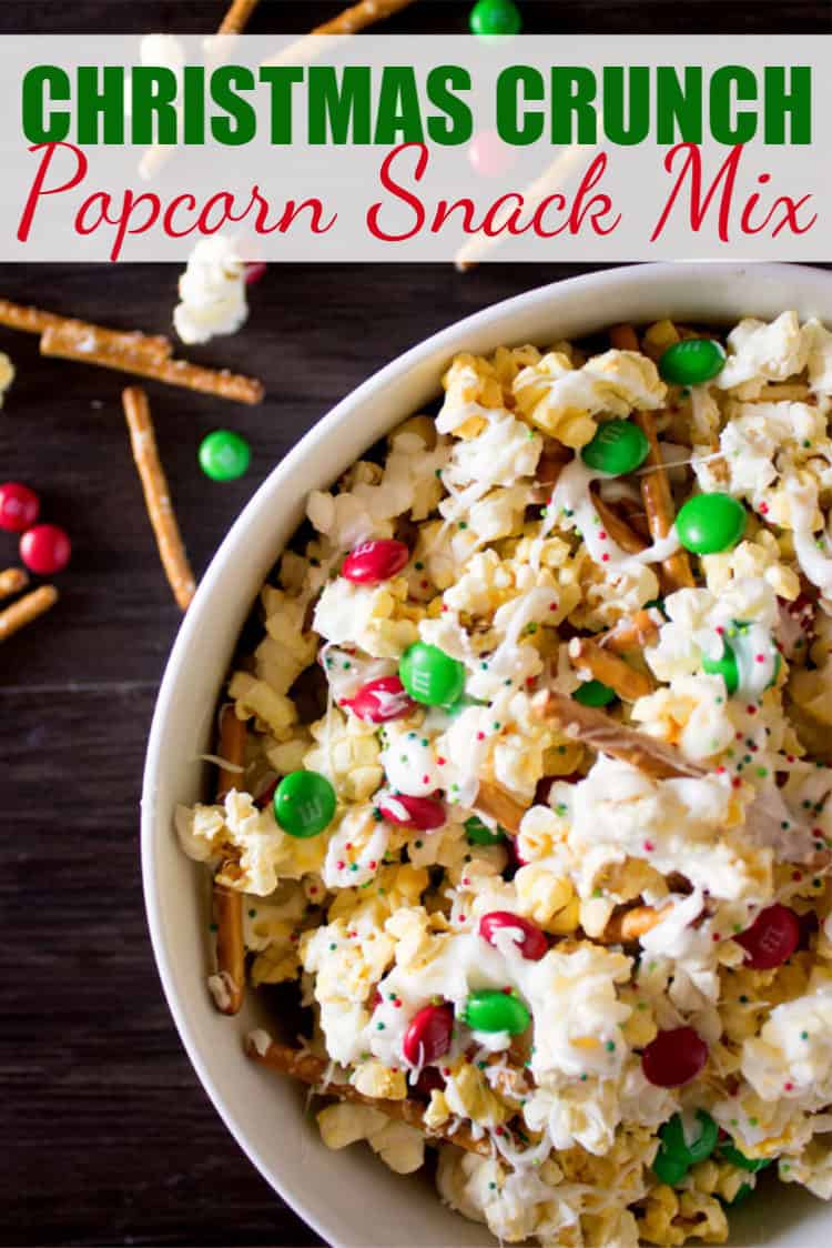 Christmas Crunch Popcorn Snack Mix in a white bowl with Pinterest text overlay