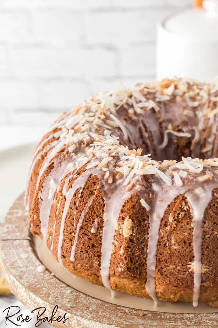 Coconut Bundt Cake with glaze and sprinkled with lightly toasted coconut