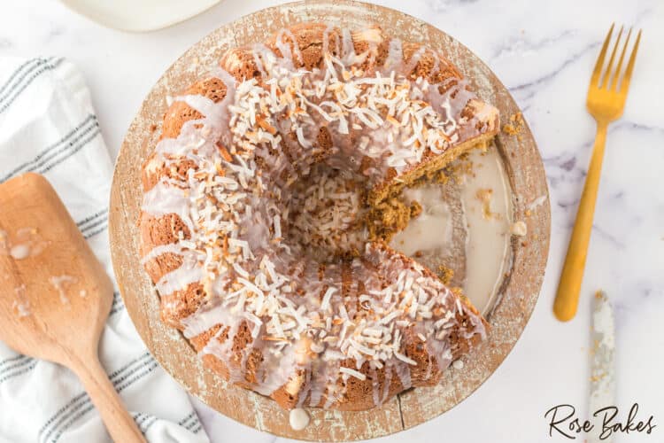 top view of the Coconut Bundt Cake with a couple of slices removed.