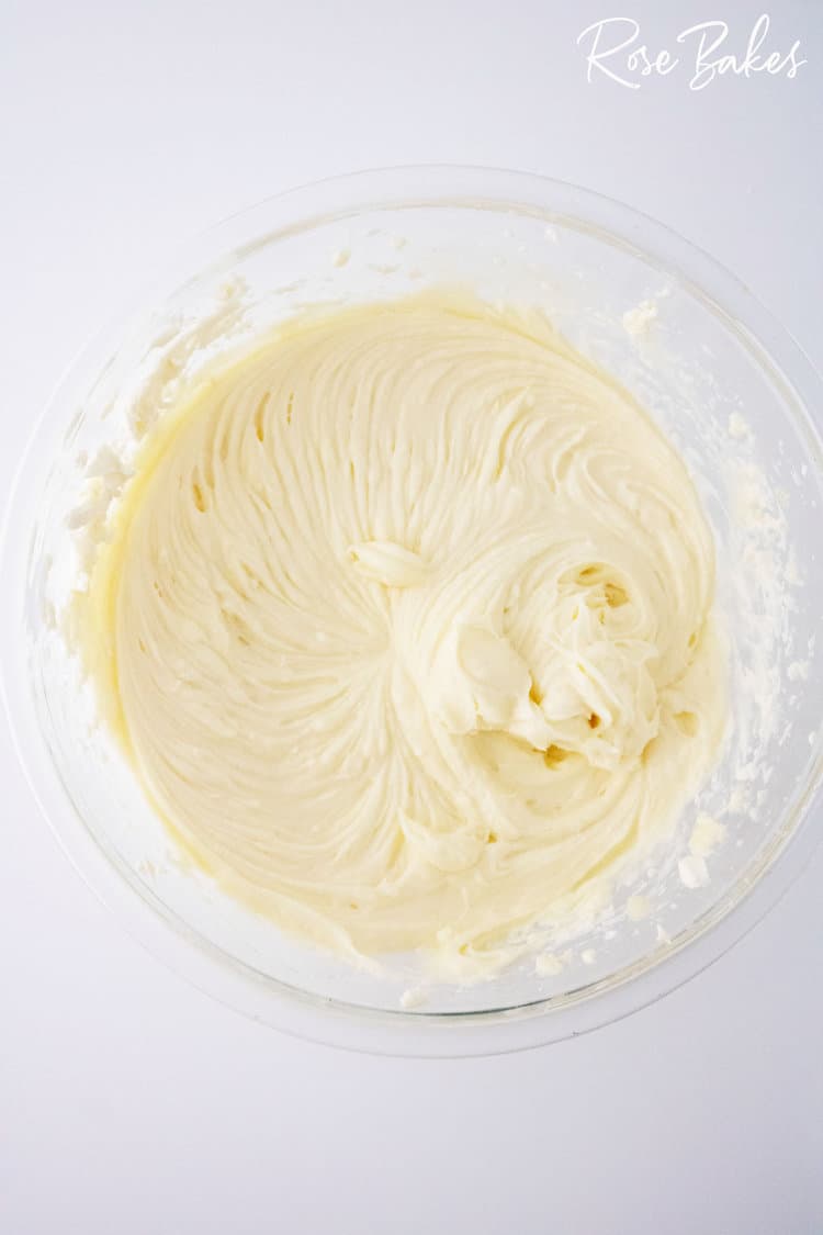 mixed up cream cheese danish filling ingredients in a clear bowl 