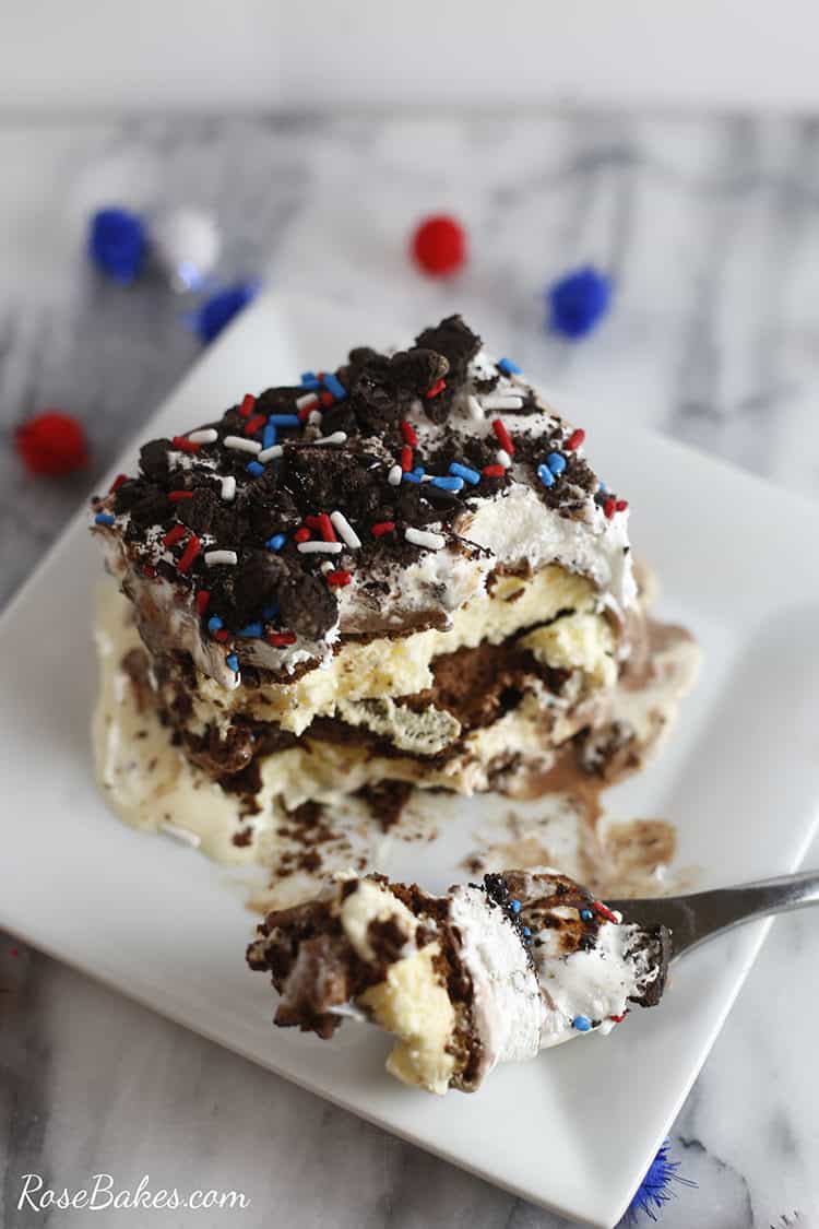 Slice of Ice Cream Sandwich Cake with a fork taking a bite out of it.