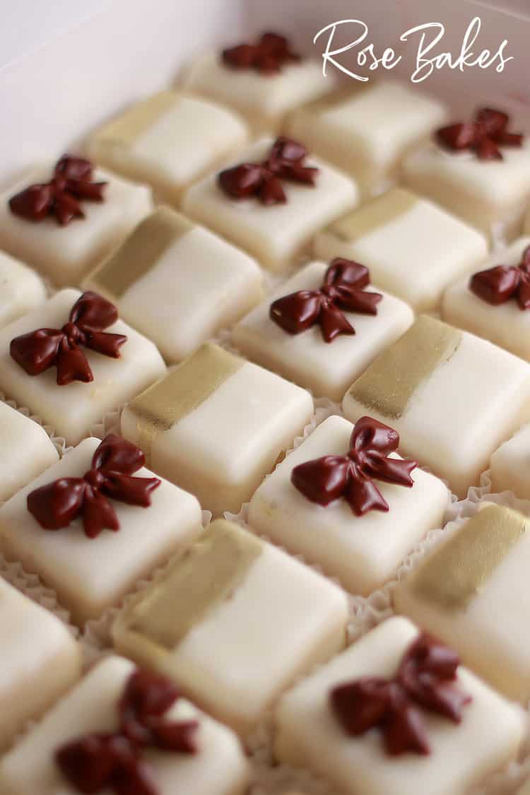petit fours with gold brush strokes or burgandy fondant bows