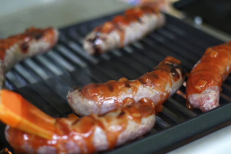 Brats on Grill with Homemade 7UP BBQ Sauce
