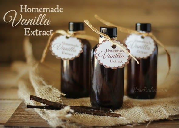 Bottles of Homemade Vanilla Extract with a Vanilla Bean on Burlap