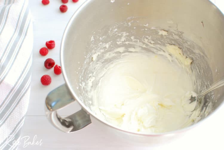 Raspberry Cinnamon Rolls icing in mixing bowl