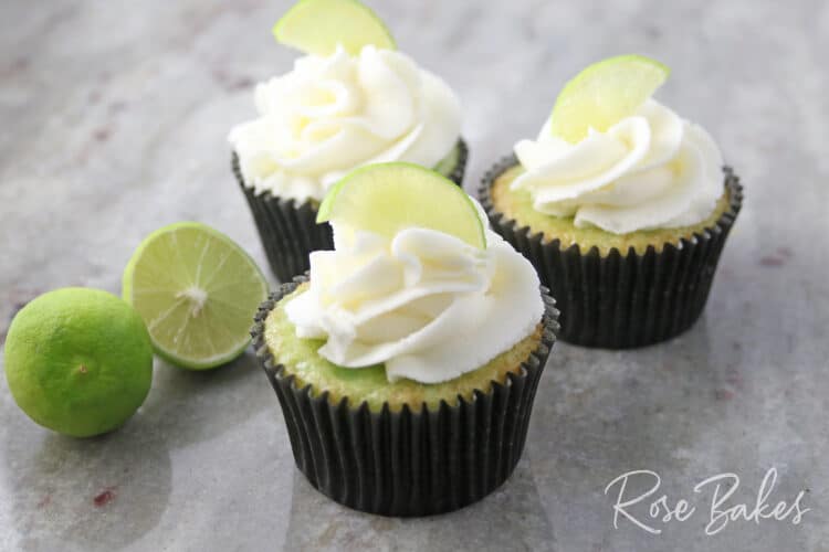 Key Lime Cream Cheese Frosting cupcakes with sliced lime for garnish 