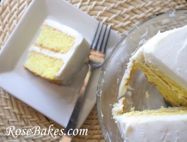 Lemon Icebox Cake slice on a white cake plate