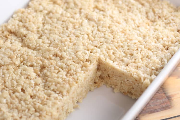 Pan of Microwave Rice Krispies Treats in pan with missing treats