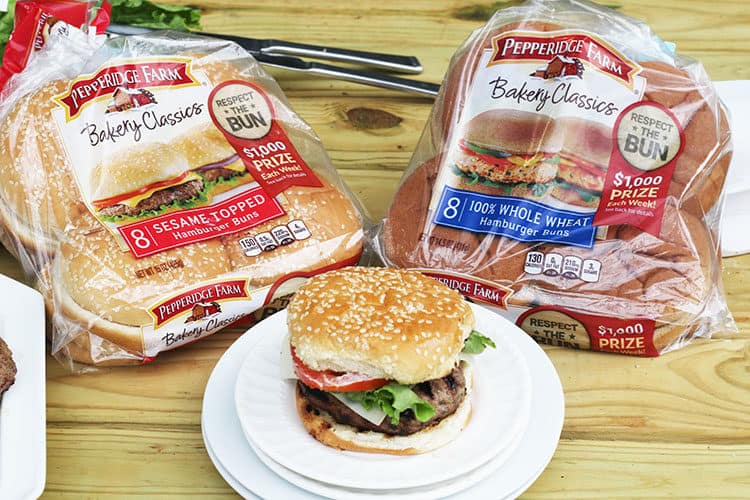 Pepperidge Farms Buns Varieties with a Perfectly grilled burger on a white plate