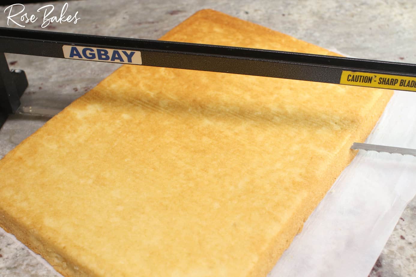 torting the cake with an Agbay cake leveler