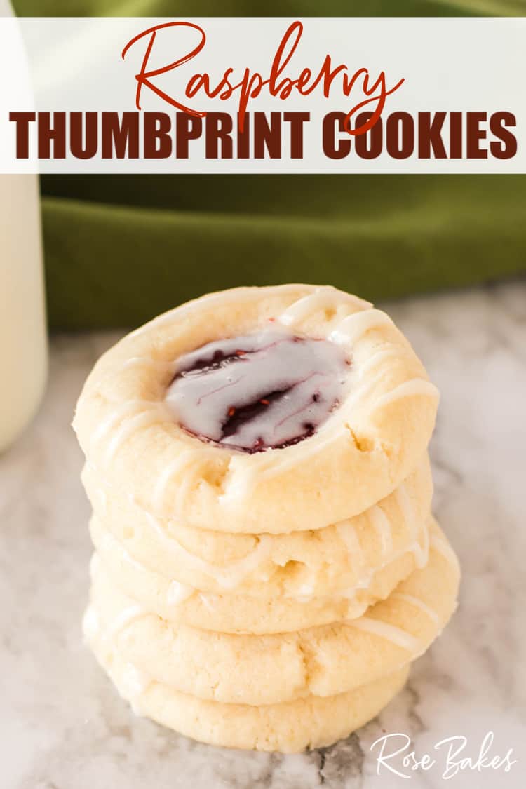 a stack of Raspberry Thumbprint cookies with a vanilla almond glaze