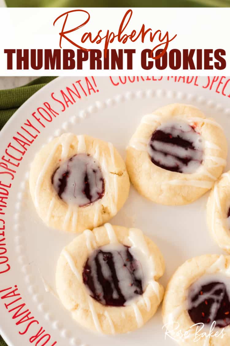 Raspberry Thumbprint cookies with a vanilla almond glaze on a cookie plate for Santa