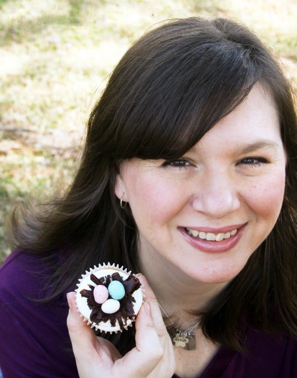 Picture Rose Atwater (owner of Rosebakes) holding easter cuopcake
